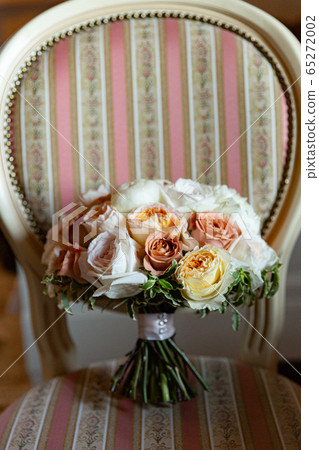 Beautiful wedding bouquet for bride in nude colors 65272002
