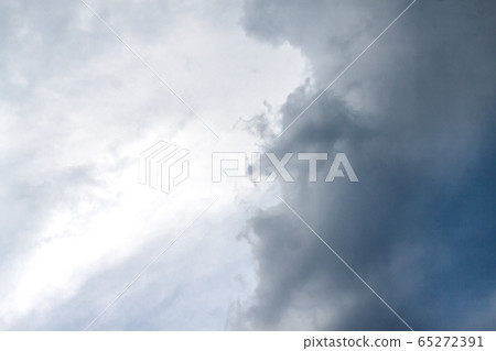 White fluffy clouds on a clear blue sky.The storm 65272391
