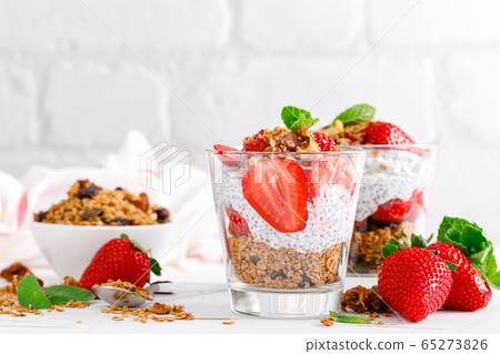 Strawberry parfait with yogurt, homemade granola Strawberry parfait with yogurt, homemade granola 65273826