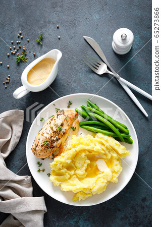 Grilled chicken breast with mashed potatoes and Grilled chicken breast with mashed potatoes and 65273866