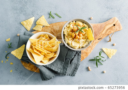 Homemade chickpea hummus with chips Homemade chickpea hummus with chips 65273956