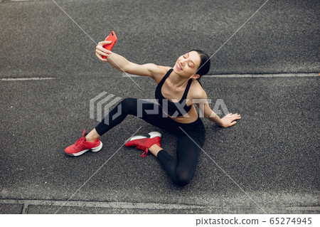 Sports girl training at the stadium Sports girl training at the stadium 65274945