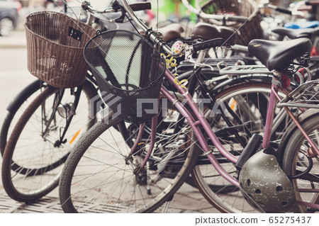 Retro bikes parked on the street in Stockholm. Toned Retro bikes parked on the street in Stockholm. Toned 65275437