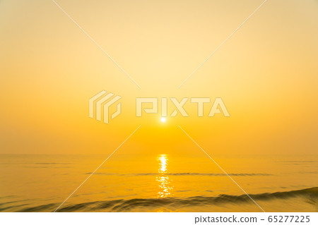 Beautiful tropical sea ocean beach at sunrise or sunset time Beautiful tropical sea ocean beach at sunrise or sunset time 65277225