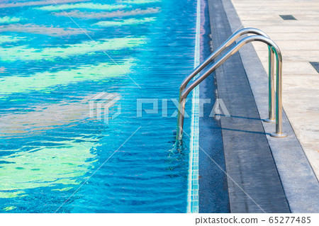 Stair around outdoor swimming pool in hotel resort Stair around outdoor swimming pool in hotel resort 65277485