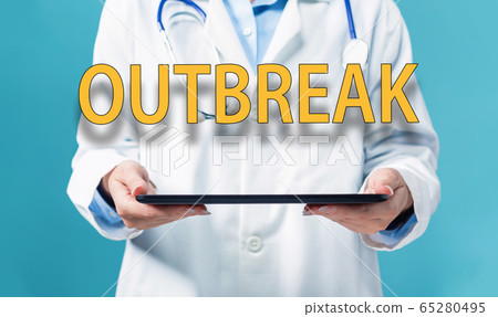 Outbreak theme with a doctor using a tablet pc 65280495