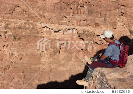 Jordan ancient city petra ruins male model Jordan ancient city petra ruins male model 65282626