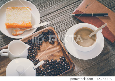 Vintage Film Look: cup of coffee with cake 65284429