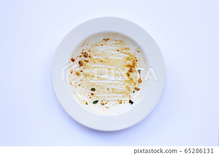 Dirty dish on white background. 65286131