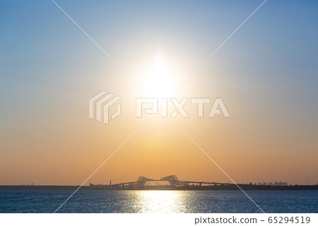 Sun over Tokyo Gate Bridge 65294519