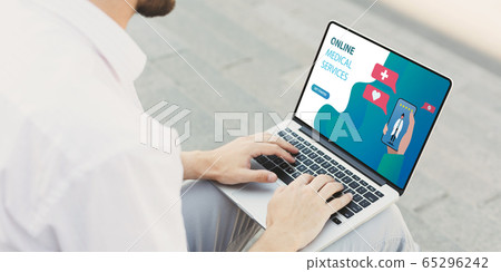 Man having consultation with doctor using laptop Man having consultation with doctor using laptop 65296242