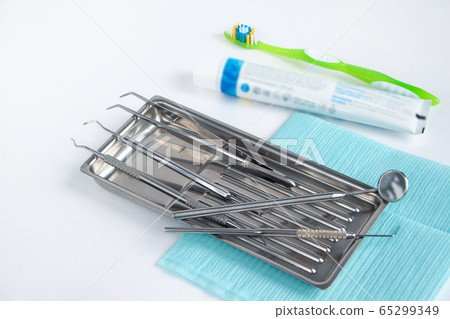 Group of tools, accessories for dental treatment. 65299349