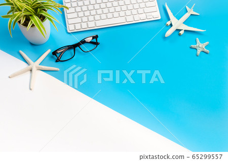 accessories of traveler on blue and white background with copy space, Travel concept, Overhead view of Traveler's accessories, accessories of traveler on blue and white background with copy space, Travel concept, Overhead view of Traveler's accessories, 65299557