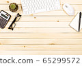 Office desk table of modern workplace with laptop on wooden table 65299572