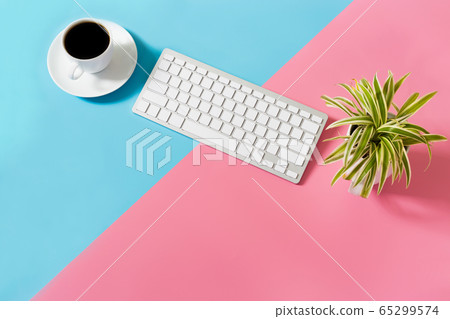 flat lay Office desk table of modern workplace with laptop on blue and pimk background, top view laptop background and copy space on black background 65299574