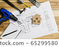 Architect workplace top view. Architectural project, blueprints, blueprint rolls on table. Construction background. Engineering tools. Copy space 65299580