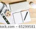 Architect workplace top view. Architectural project, blueprints, blueprint rolls on table. Construction background. Engineering tools. Copy space 65299581