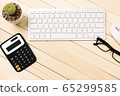 Office desk table of modern workplace with laptop on wooden table, top view laptop background and copy space on wooden background 65299585