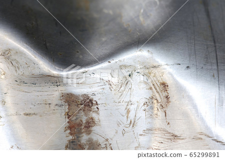 Old crumpled and scratched metal texture Old crumpled and scratched metal texture 65299891