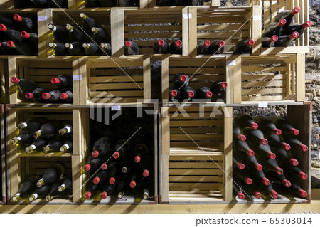 wine cellar with big bottle of wine 65303014