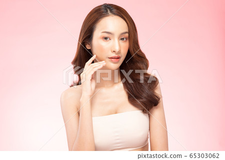 Beautiful Asian woman smile with clean and fresh skin Happiness and cheerful with positive emotional,isolated on pink background,Beauty Cosmetics and spa Treatment Concept 65303062
