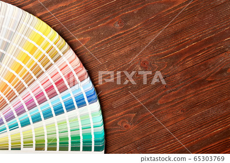 Painting tools on wooden table 65303769