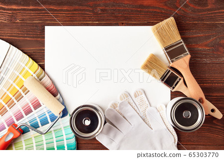 Painting tools on wooden table 65303770