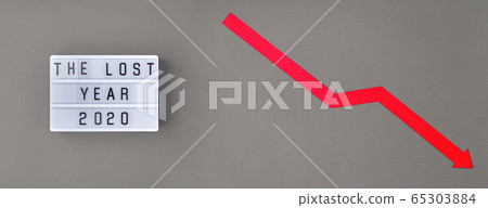 The lost year 2020 slogan and red down arrow. 65303884