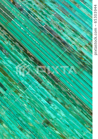 Glass background with stripe pattern in hue of Glass background with stripe pattern in hue of 65303944