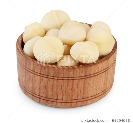 macadamia nuts in wooden bowl isolated on white background with clipping path and full depth of field macadamia nuts in wooden bowl isolated on white background with clipping path and full depth of field 65304628