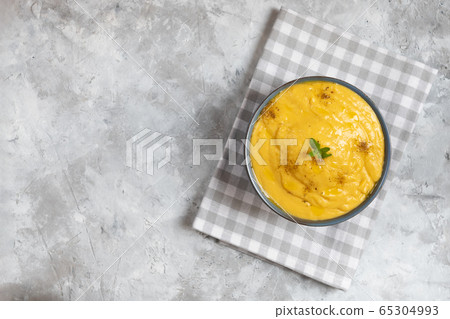 Vegeratian red lentil creamy soup in a bowl Vegeratian red lentil creamy soup in a bowl 65304993