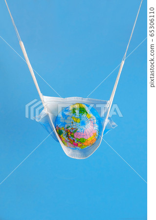 Earth globe in medicine mask to fight against Corona virus Earth globe in medicine mask to fight against Corona virus 65306110