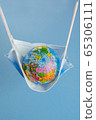 Earth globe in medicine mask to fight against Corona virus 65306111