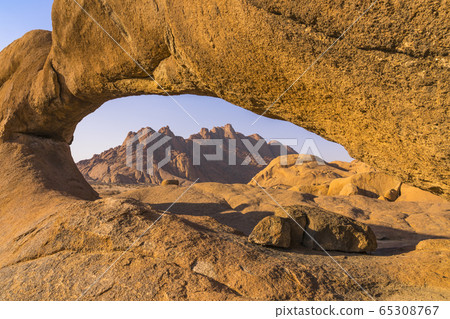 Rock arch in the Spitzkoppe National Park in Namibia. Rock arch in the Spitzkoppe National Park in Namibia. 65308767