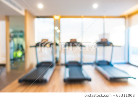 Abstract blur gym room interior with fitness equipment Abstract blur gym room interior with fitness equipment 65311008