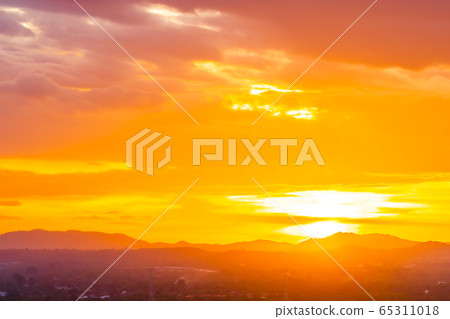 Beautiful landscape with sunrise or sunset over mountain Beautiful landscape with sunrise or sunset over mountain 65311018