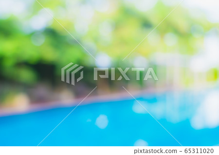 Abstract blur outdoor swimming pool in hotel resort Abstract blur outdoor swimming pool in hotel resort 65311020