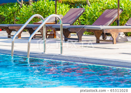 Stair around outdoor swimming pool in hotel resort Stair around outdoor swimming pool in hotel resort 65311028