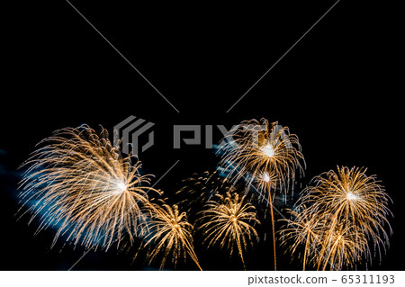 Beautiful colorful firework display at night for celebrate Beautiful colorful firework display at night for celebrate 65311193