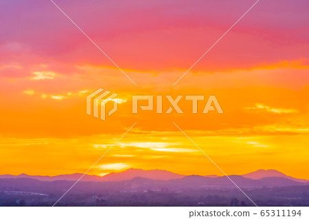 Beautiful landscape with sunrise or sunset over mountain Beautiful landscape with sunrise or sunset over mountain 65311194