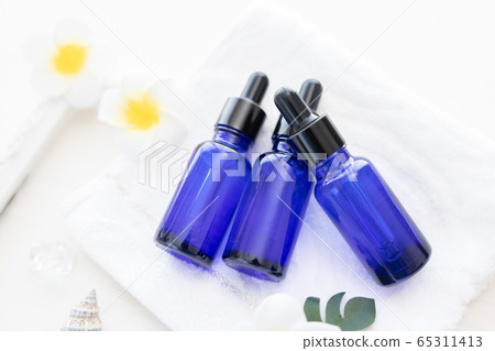 Aroma oil jar and plumeria flower Aroma oil jar and plumeria flower 65311413