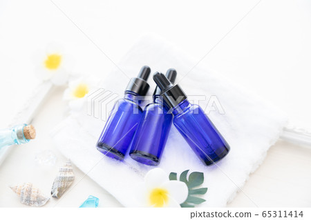 Aroma oil jar and plumeria flower Aroma oil jar and plumeria flower 65311414