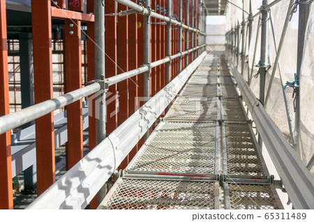Construction site scaffolding 65311489