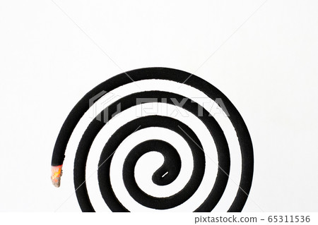 Black spiral mosquito repellent coil on white 65311536