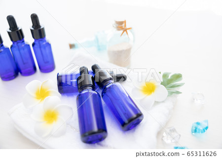 Aroma oil jar and plumeria flower Aroma oil jar and plumeria flower 65311626