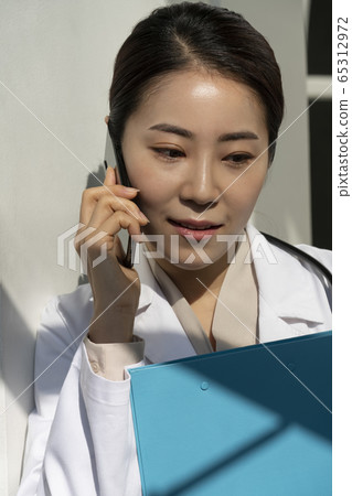 Business, woman, hospital Business, woman, hospital 65312972