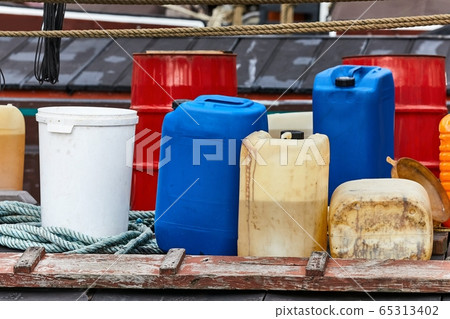 Plastic cans of chemicals 65313402