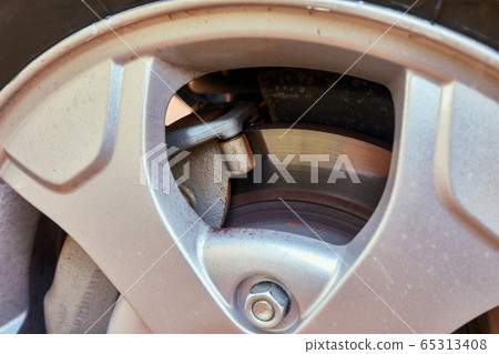 Wheel of a SUV car with brakes Wheel of a SUV car with brakes 65313408