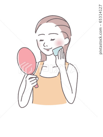 Woman doing skin care with cotton Woman doing skin care with cotton 65314127