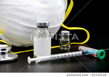 Medical healthcare concept. Diagnosis and cure of Coronavirus. stethoscope, blood test, mask and Medical healthcare concept. Diagnosis and cure of Coronavirus. stethoscope, blood test, mask and 65316526